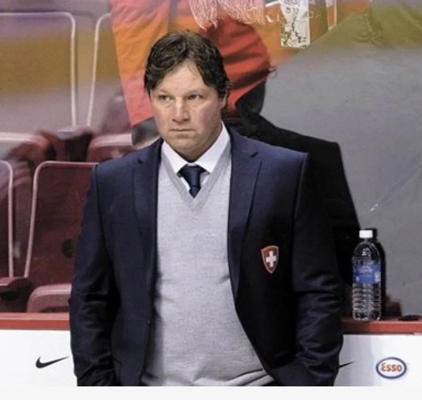 Paul DiPietro coaching from the Swiss bench